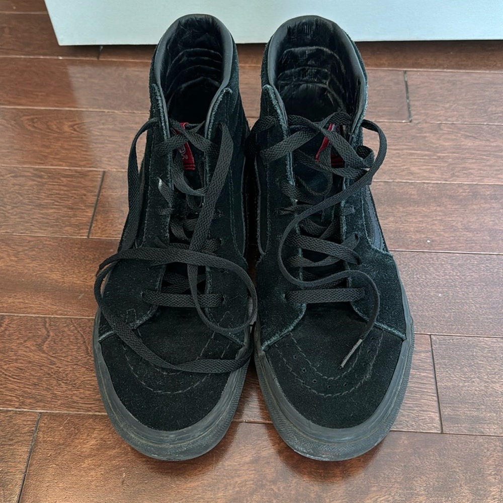 Black women’s Vans high tops